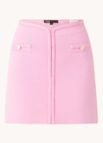 Mini-jupe en maille fine Jadena avec boutons décoratifs rose Maje